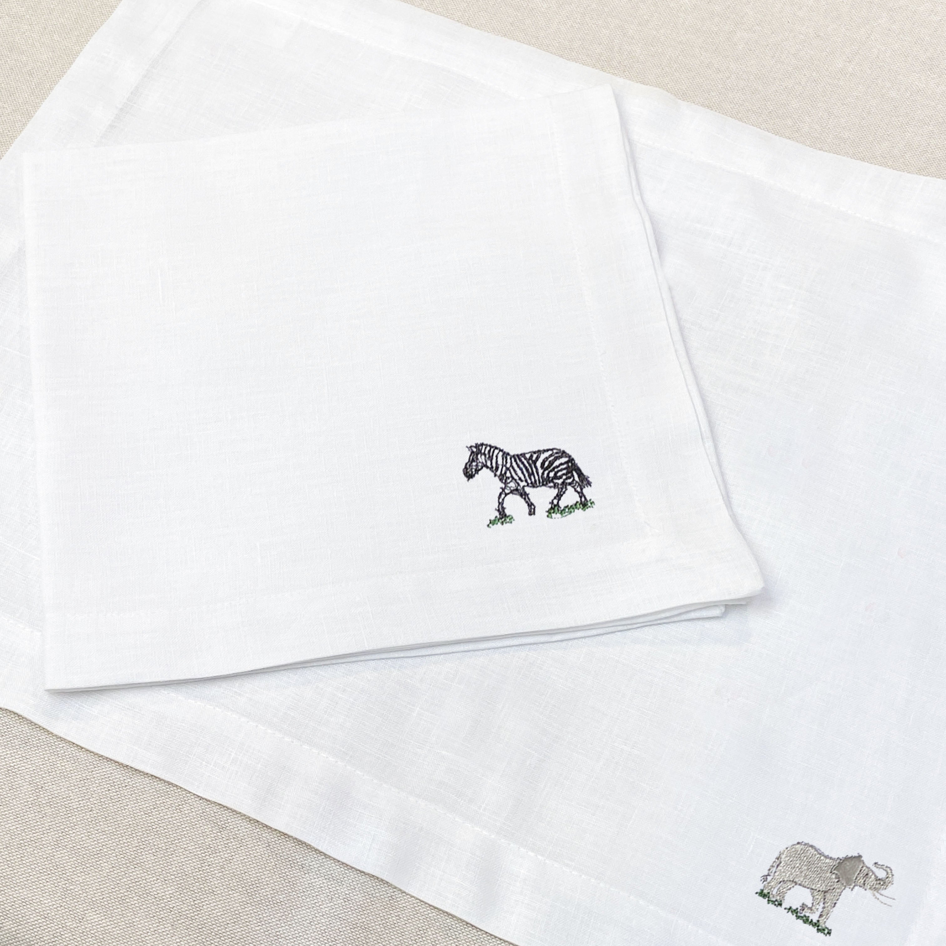 servilleta de lino bordado safari - Barioles Casa