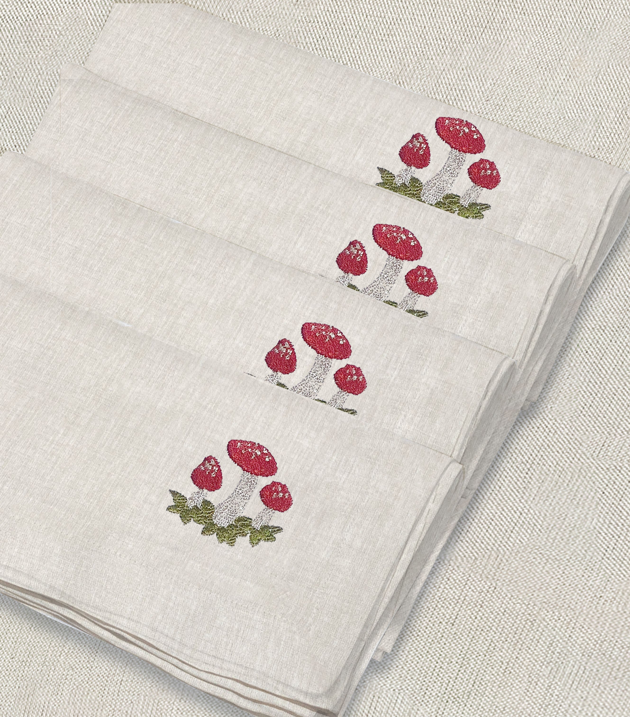 servilleta de lino arena bordado hongos