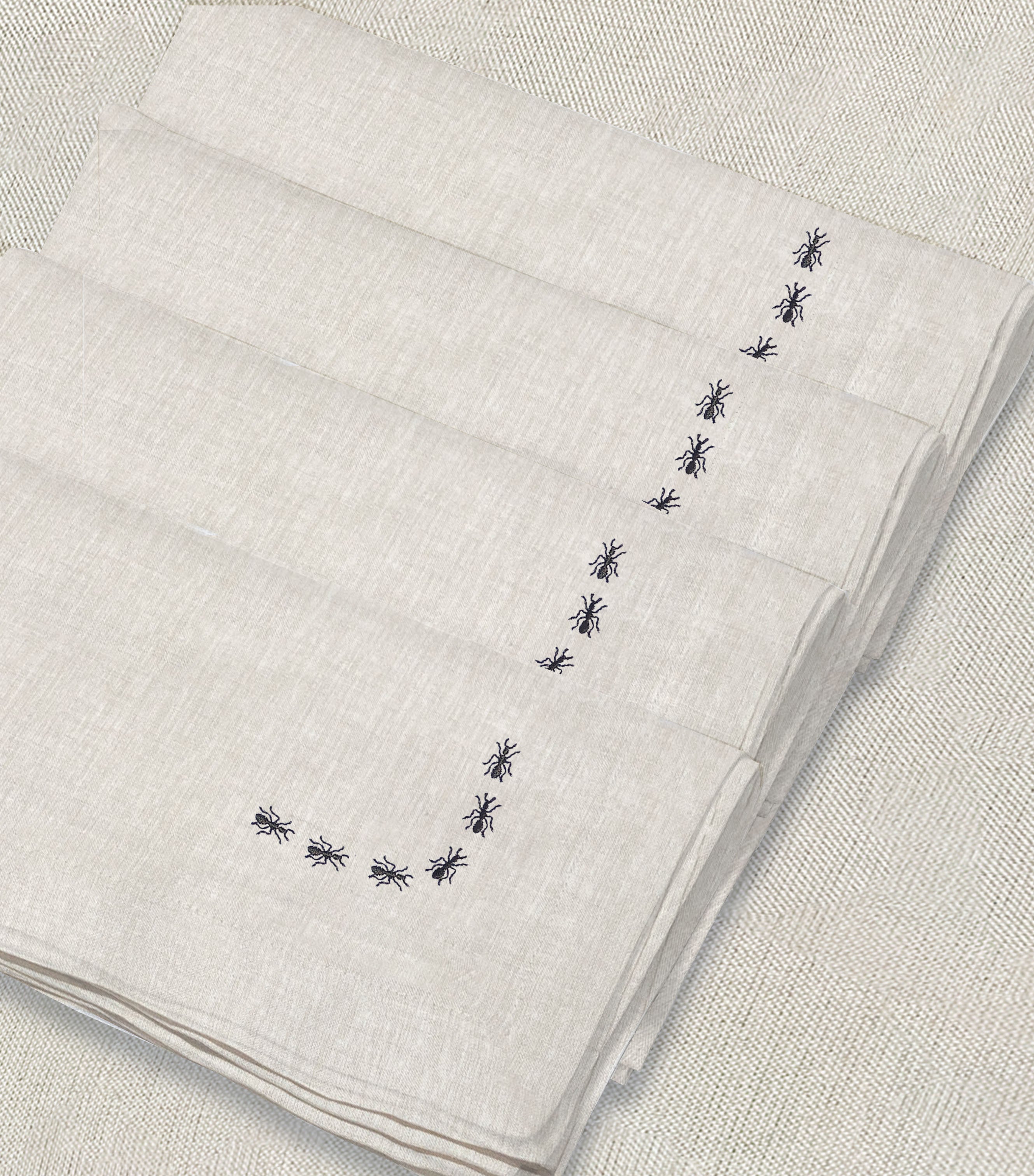 servilleta de lino arena bordado hormigas
