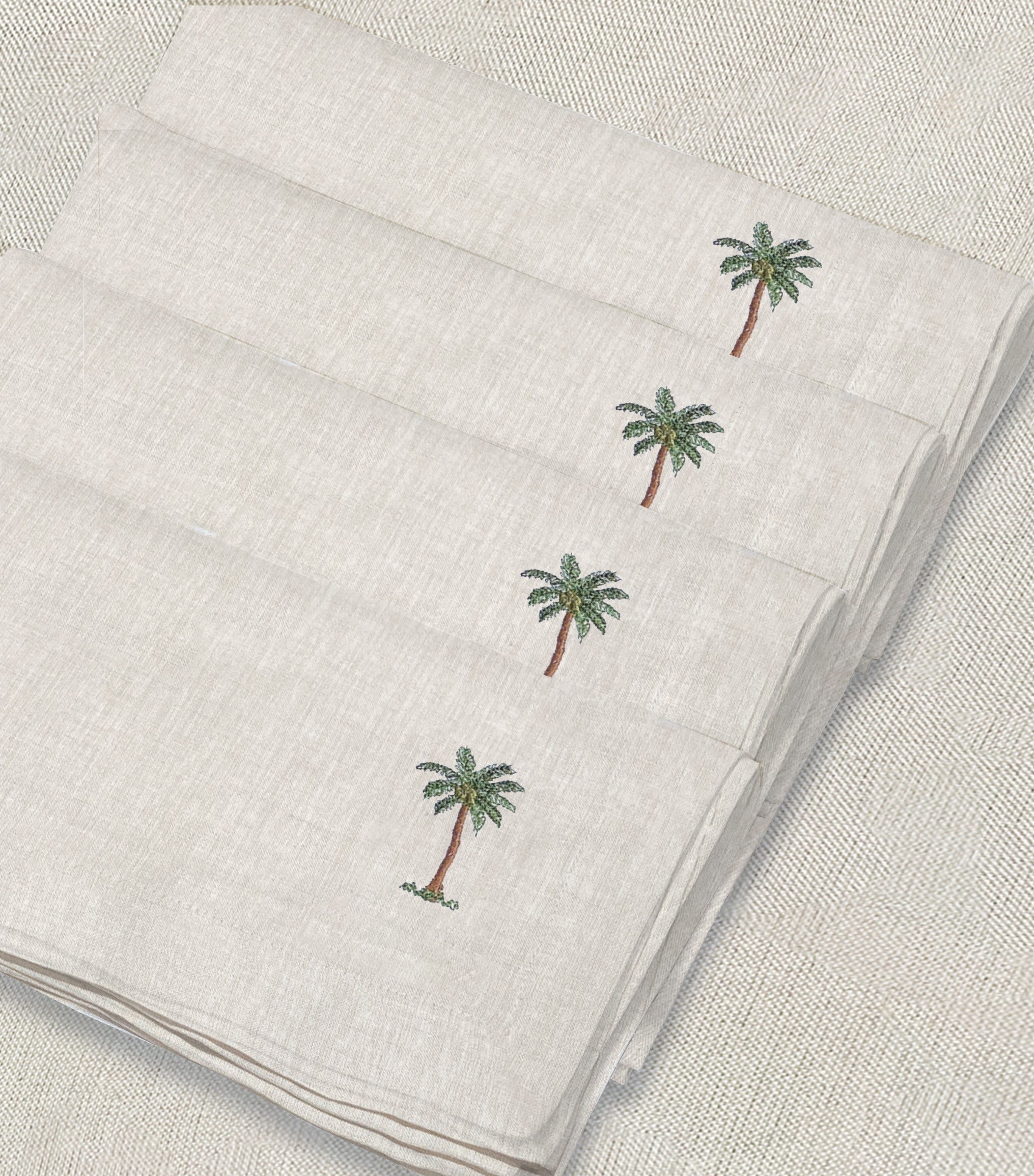 servilleta de lino arena bordado palmera