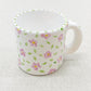 taza chica de cerámica pintada · flores