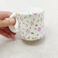 taza chica de cerámica pintada · flores