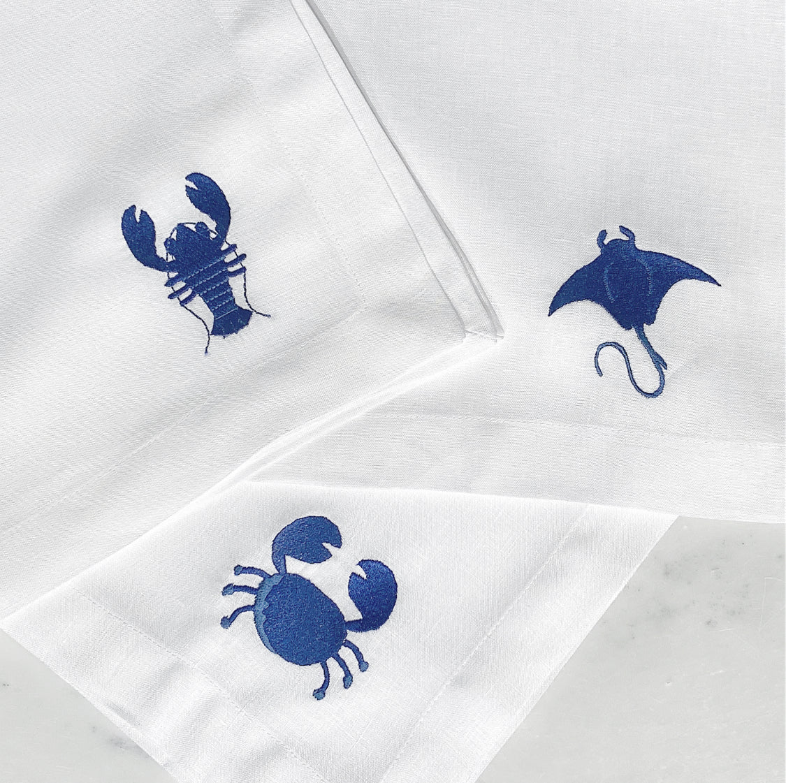 individual y servilleta de lino bordado mariscos