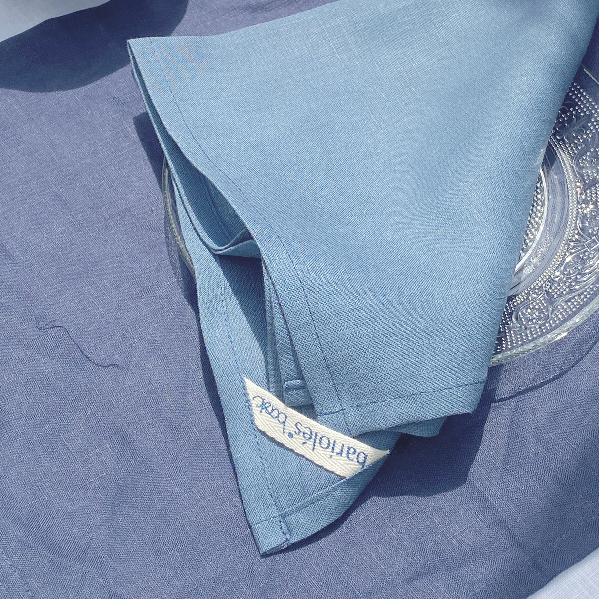servilleta de lino con individual de lino color azules